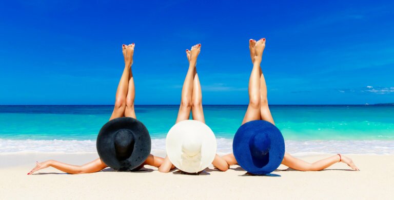 attractive women's legs on beach